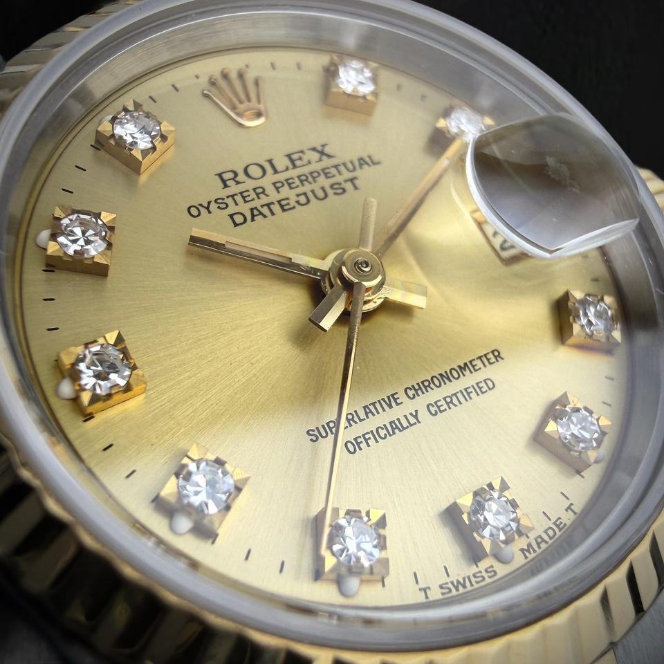 Rolex Datejust 26 mm Bicolor Damenuhr mit champagnerfarbenem Diamantzifferblatt ab Werk