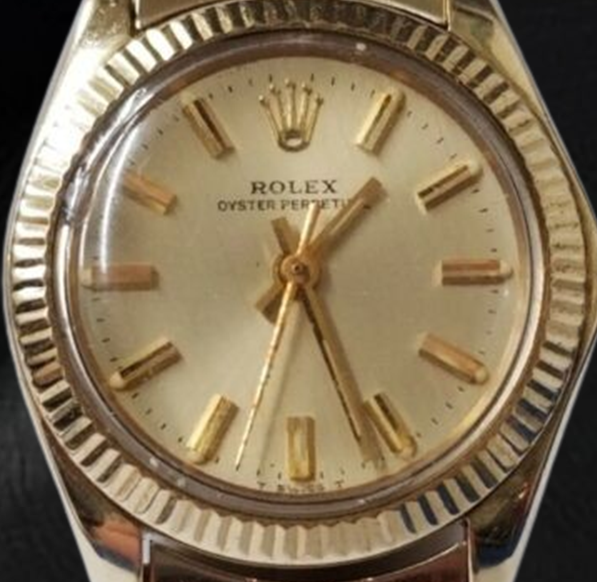 Rolex Oyster Perpetual 24 mm Champagner-Stab-Zifferblatt Gelbgold-Uhr