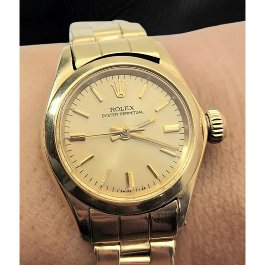 Rolex Oyster Perpetual 24 mm Champagner Stabzifferblatt Uhr Gelbgold Oyster Armband