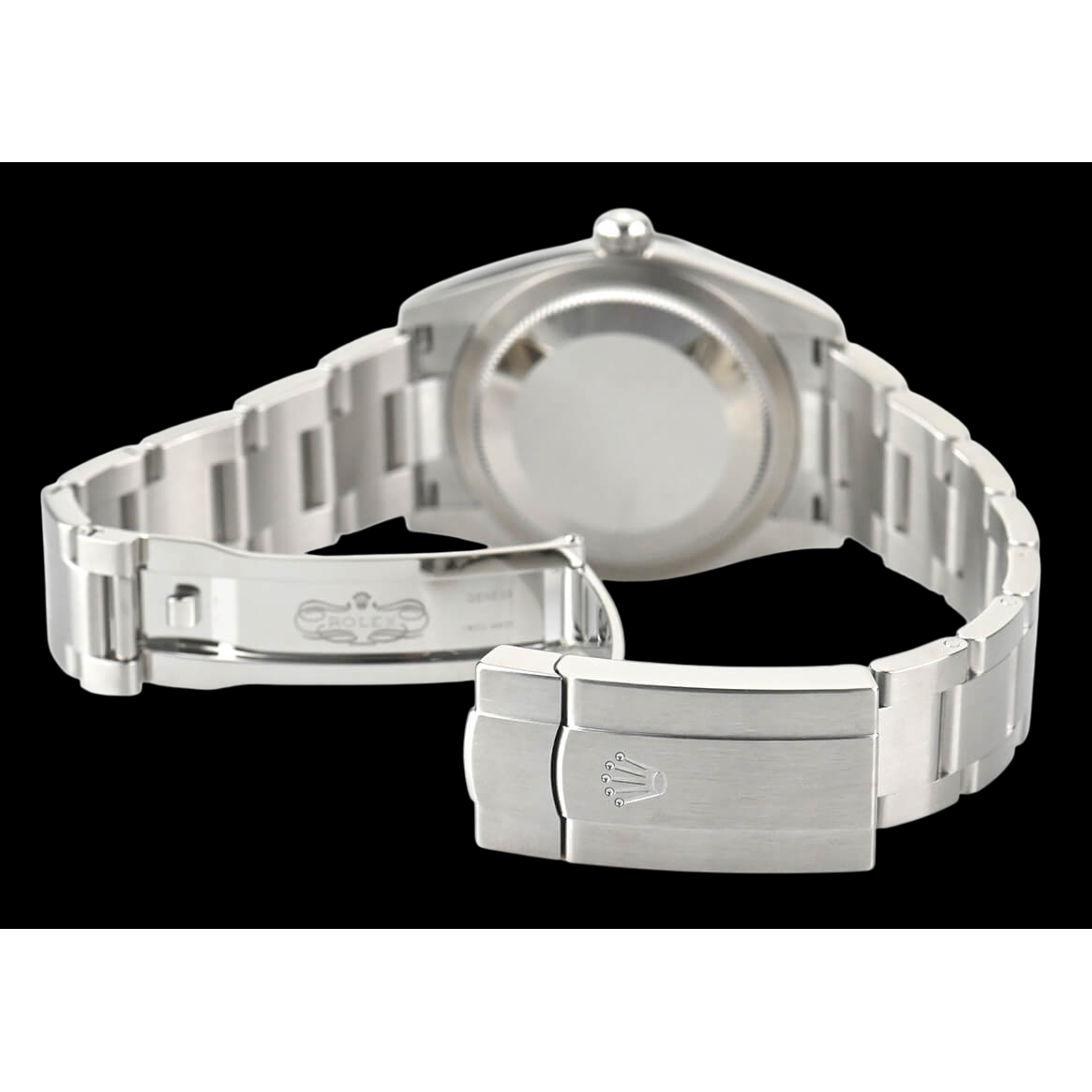 Rolex Oyster Perpetual 31 mm lachsfarbene Damenuhr aus Stahl mit leuchtendem Zifferblatt