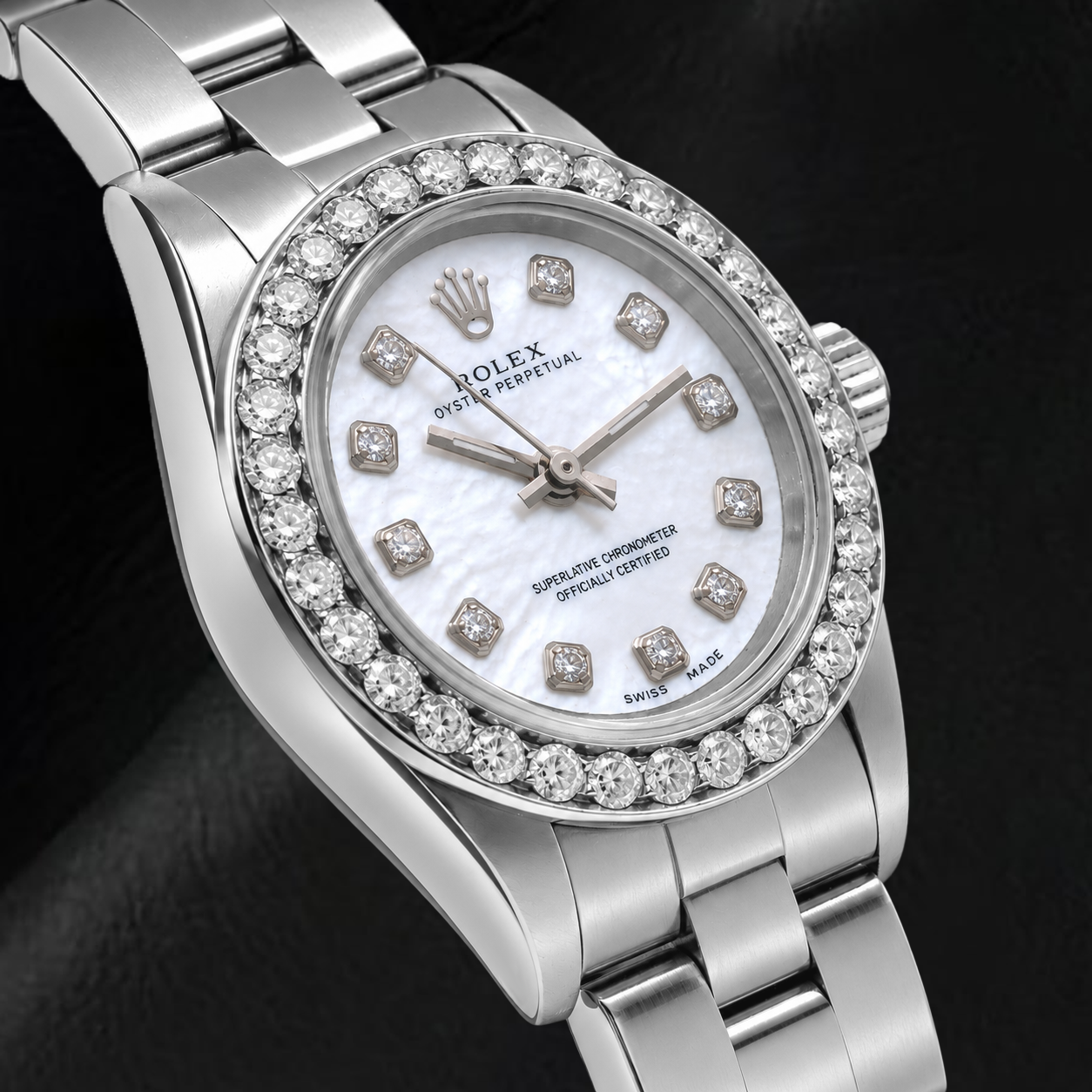 Rolex Oyster Perpetual 67193 26 mm Edelstahl Uhr mit Diamantzifferblatt aus weißem Perlmutt