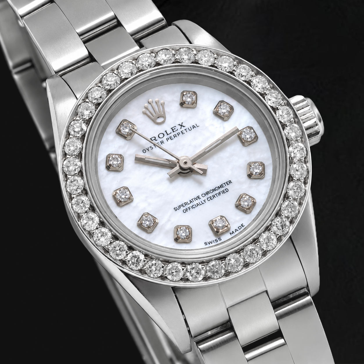 Rolex Oyster Perpetual 67193 26 mm Edelstahl Uhr mit Diamantzifferblatt aus weißem Perlmutt