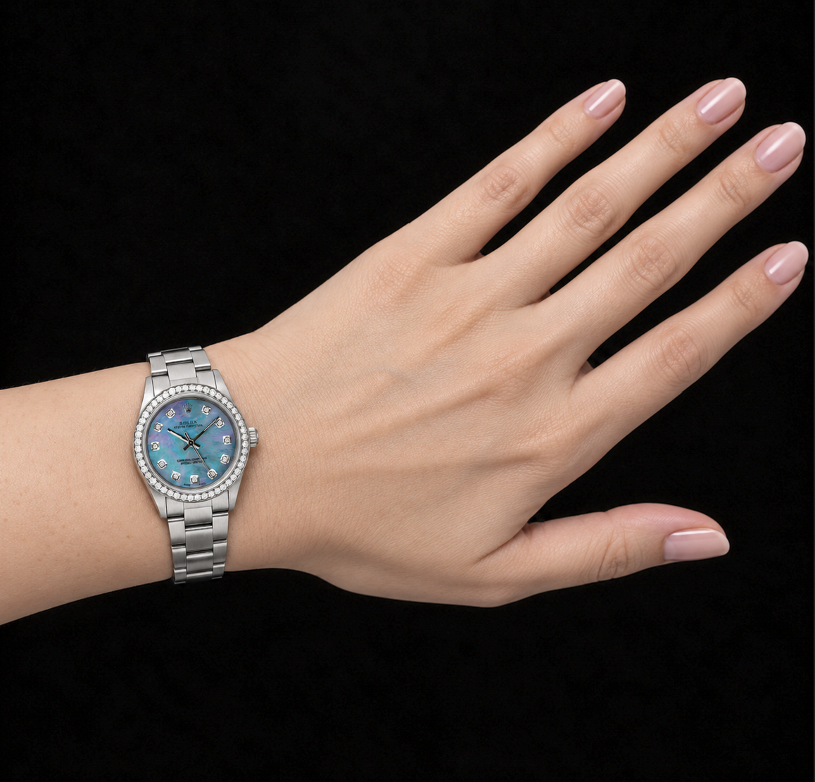 Rolex Oyster Perpetual 67480 31 mm Blaues Perlmutt-Diamantzifferblatt Edelstahl