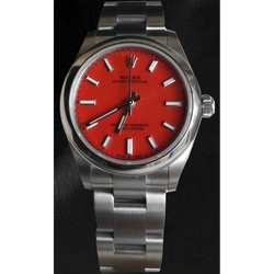 Rolex Oyster Perpetual Korallenrote Stahluhr mit leuchtendem Zifferblatt