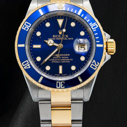 Rolex Submariner Date 16613 40 mm Bicolor Uhr blaues Leuchtzifferblatt