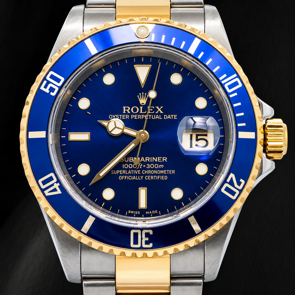 Rolex Submariner Date 16613 40 mm Bicolor Uhr blaues Leuchtzifferblatt