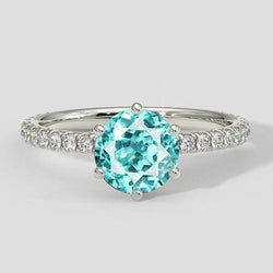 Runder Paraiba-Ring mit 6 Krappen und Diamantakzenten