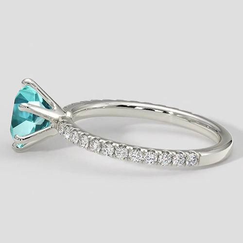 Runder Paraiba-Ring mit 6 Krappen und Diamantakzenten