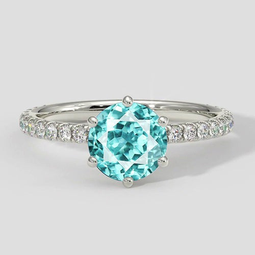 Runder Paraiba-Ring mit 6 Krappen und Diamantakzenten