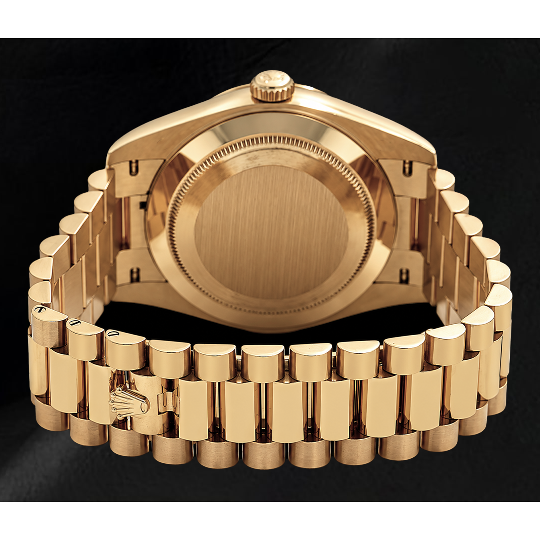 Rolex Day-Date 40 mm 228238 Uhr aus Gelbgold mit silbernem Motiv-Zifferblatt und President-Armband
