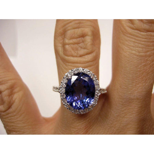 2,15 kt blauer tansanit im ovalschliff mit diamantring gold feiner schmuck