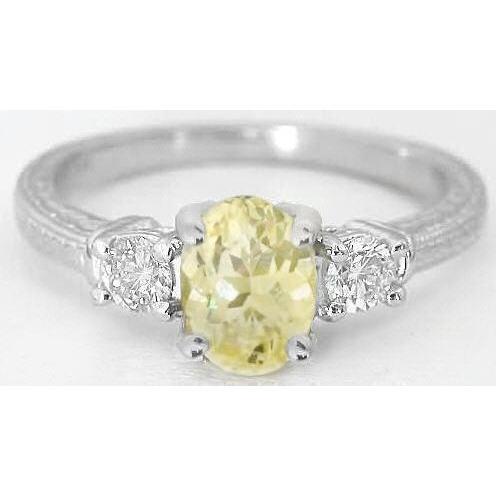 3 Karat Drei-Stein-Ring mit gelbem Saphir und Diamanten. 14 Karat Weißgold