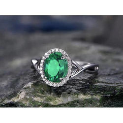 3,5 Karat grüner Smaragd im Ovalschliff mit Diamant-Verlobungsring