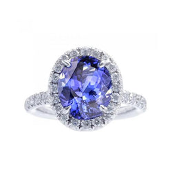 7.75 ct Goldschmuck Ovaler Tansanit mit Halo-Aus der Erde Abgebauter Natürlicher Diamantring