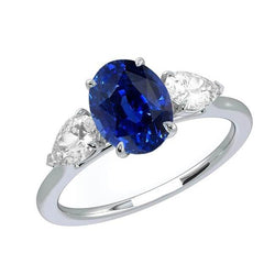 Birnen-Diamant-Drei-Steine-Ring Oval tiefblauer Saphir 3 Karat