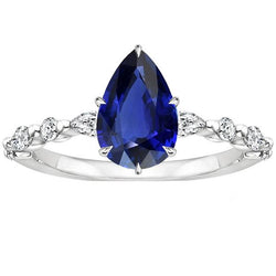 Birnen-Aus der Erde Abgebauter Natürlicher Diamant-Jubiläumsring mit blauem Saphir in der Mitte Gold 5 Karat