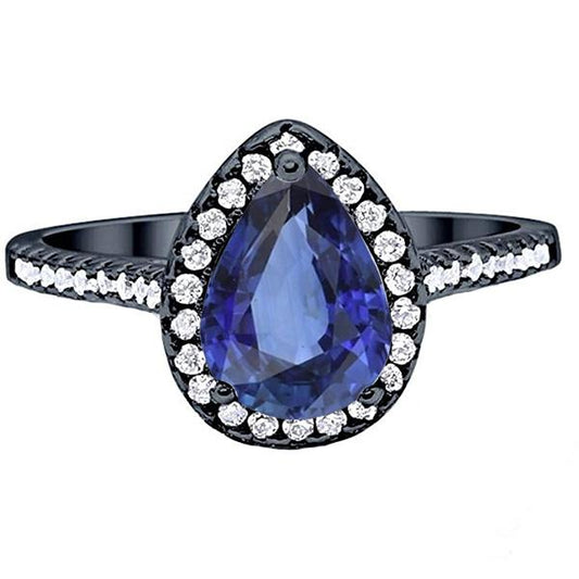 Birnenförmiger Halo-Ring aus Schwarzgold, blauer Saphir und Diamanten, 4 Karat - harrychadent.de