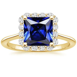 Halo-Ring aus Gelbgold mit Diamanten und blauem Saphir im Princess-Schliff 6 Karat