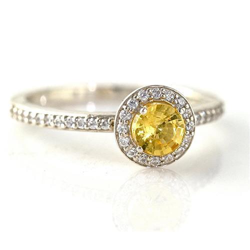 Halo-Ring aus Weißgold mit rundem gelben Saphir und Diamanten 4.50 Karat
