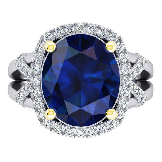 Ovaler blauer Saphir und Diamanten im Rundschliff-Edelsteinring 7.81 Karat