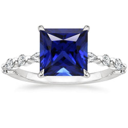 Ring mit runden und birnenförmigen Aus der Erde Abgebauter Natürlicher Diamanten mit blauem Saphir im Princess-Schliff 5,25 Karat