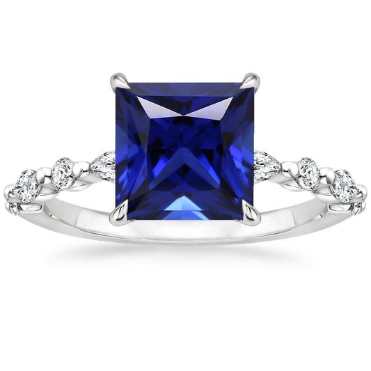 Ring mit runden und birnenförmigen Diamanten mit blauem Saphir im Princess-Schliff 5,25 Karat - harrychadent.de