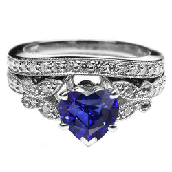 Verlobungsring-Set mit blauem Saphir und Herz im Schmetterlingsstil 4 Karat